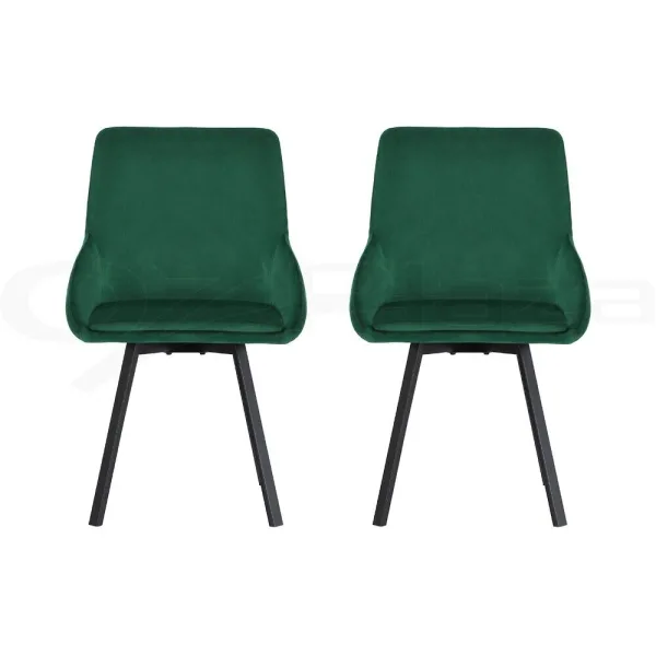 two green velvet dining chairs front facing on white backlground