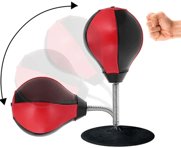 punching bag desk toy being hit by fist