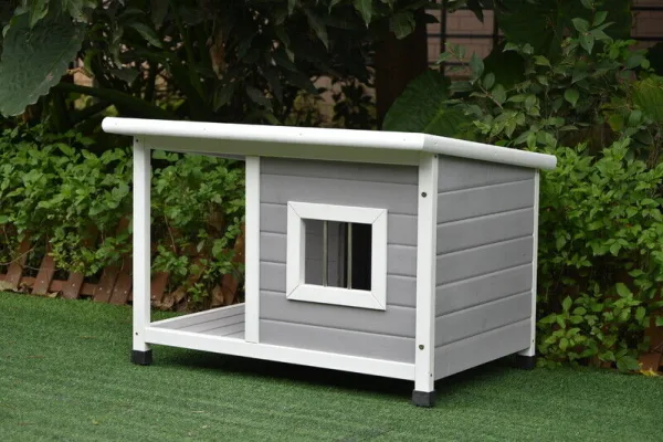 a dog kennel melbourne on green turf from the side
