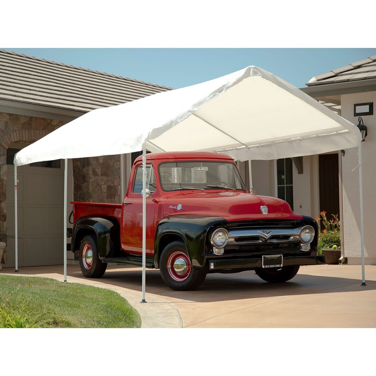 carport portable over red truck in driveway